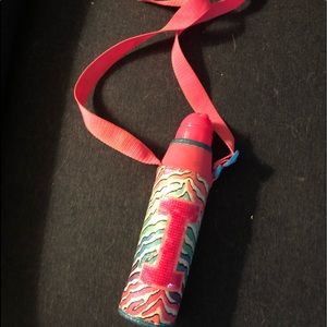 Shoulder strap water bottle.